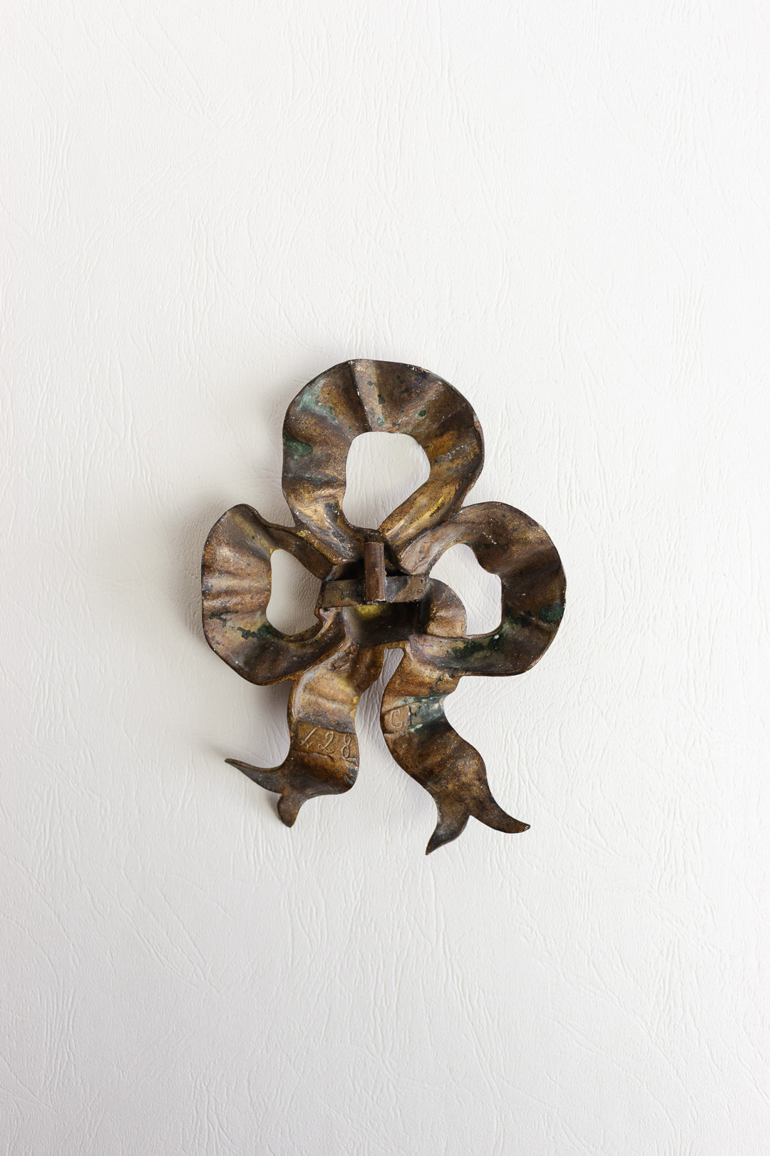 antique french oversized brass bow