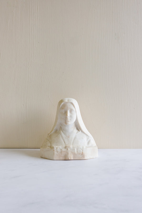 antique French stone bust, “St. Therèse de Lisieux”