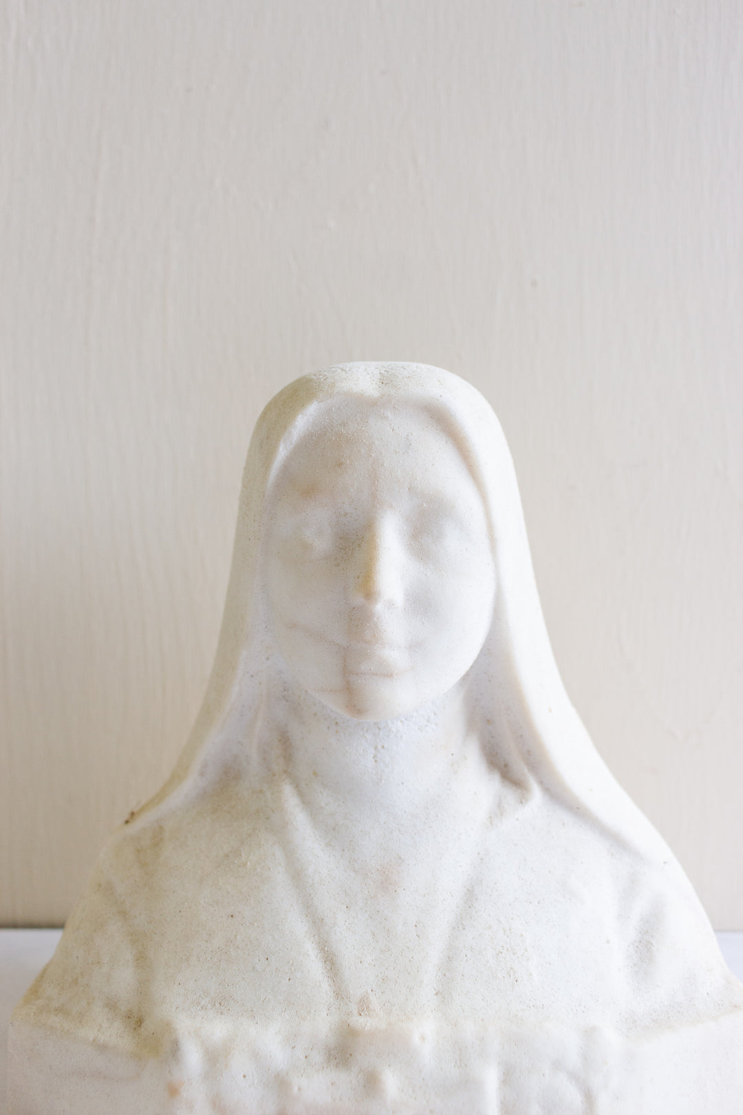 antique French stone bust, “St. Therèse de Lisieux”