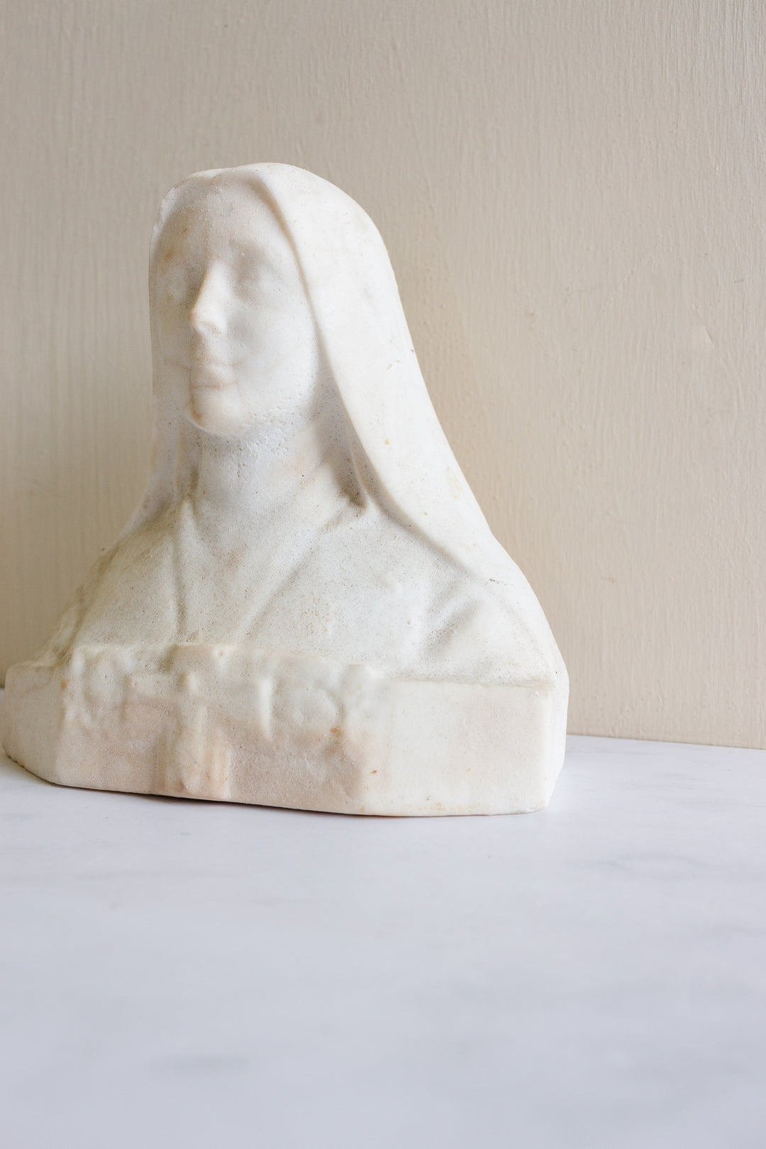 antique French stone bust, “St. Therèse de Lisieux”