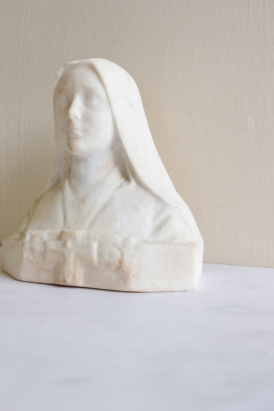 antique French stone bust, “St. Therèse de Lisieux”