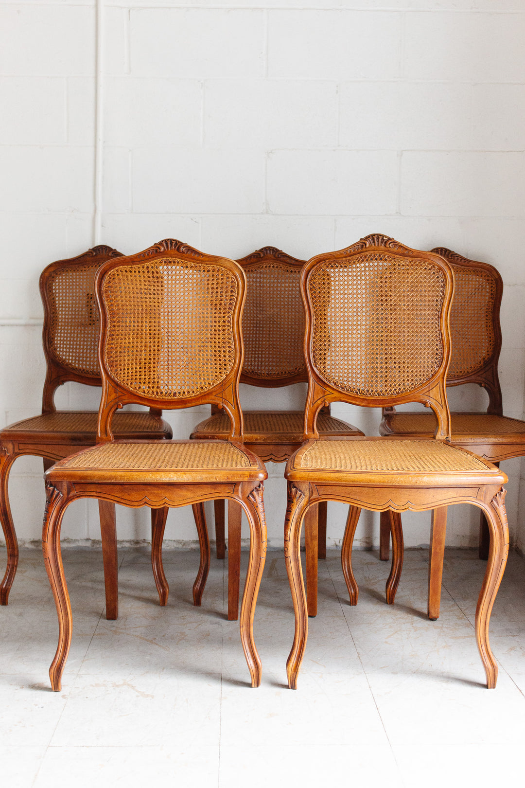 vintage French Louis XV walnut and cane dining chairs, set of 5