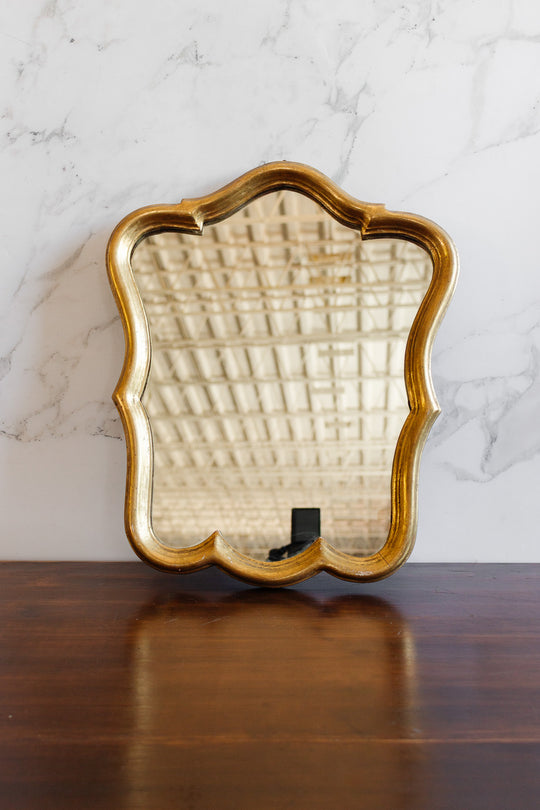 1970s Italian rococo style gilt mirror with scalloped edge