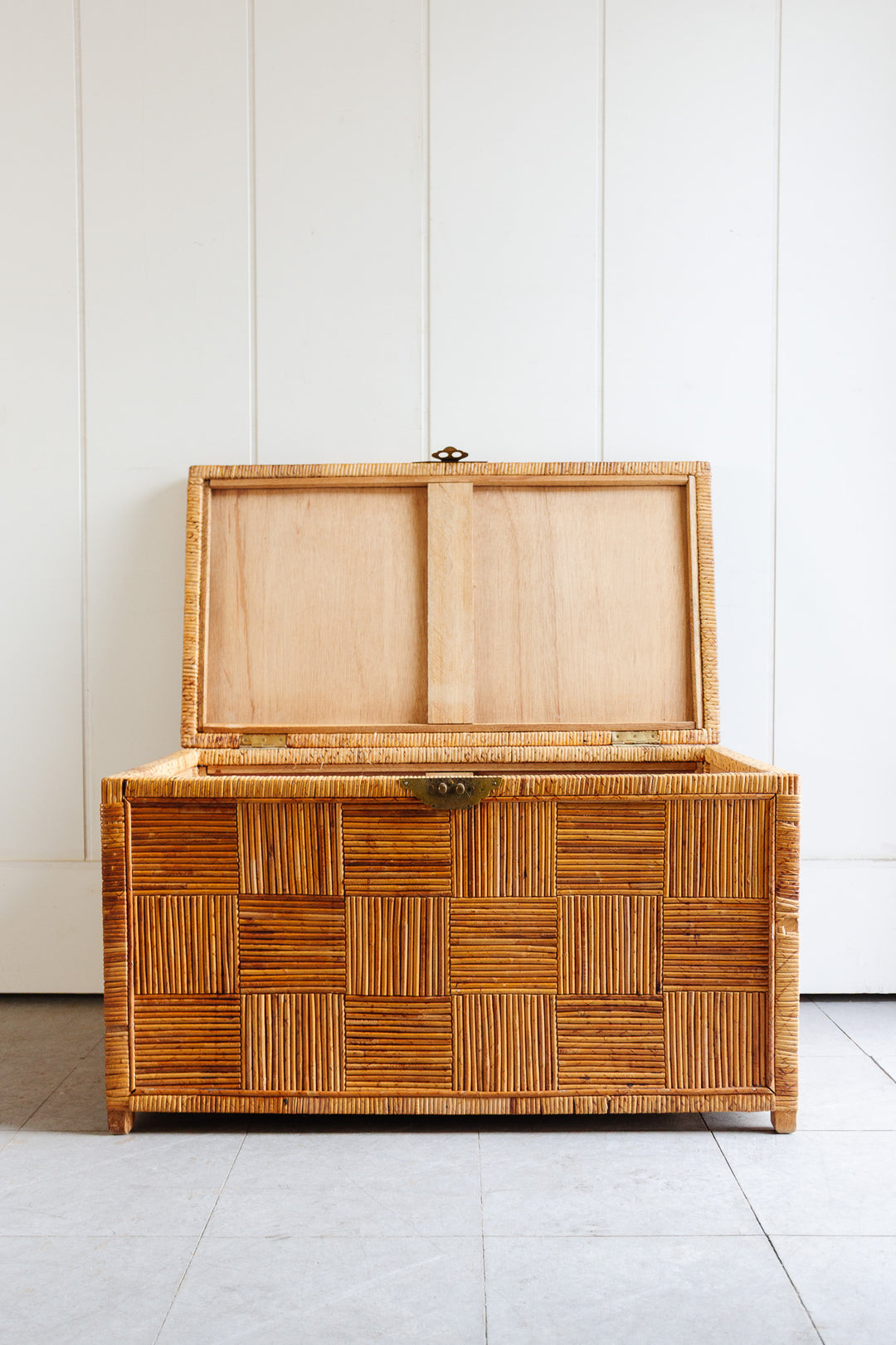 midcentury parquet pencil reed trunk with brass hardware