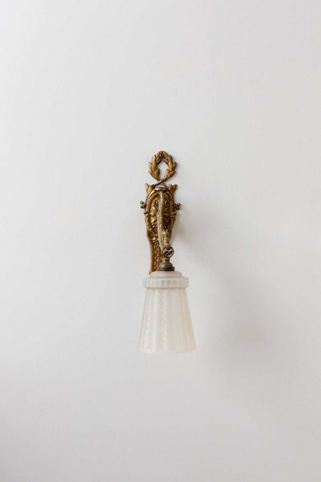 pair of art deco french brass wall sconces with glass shades