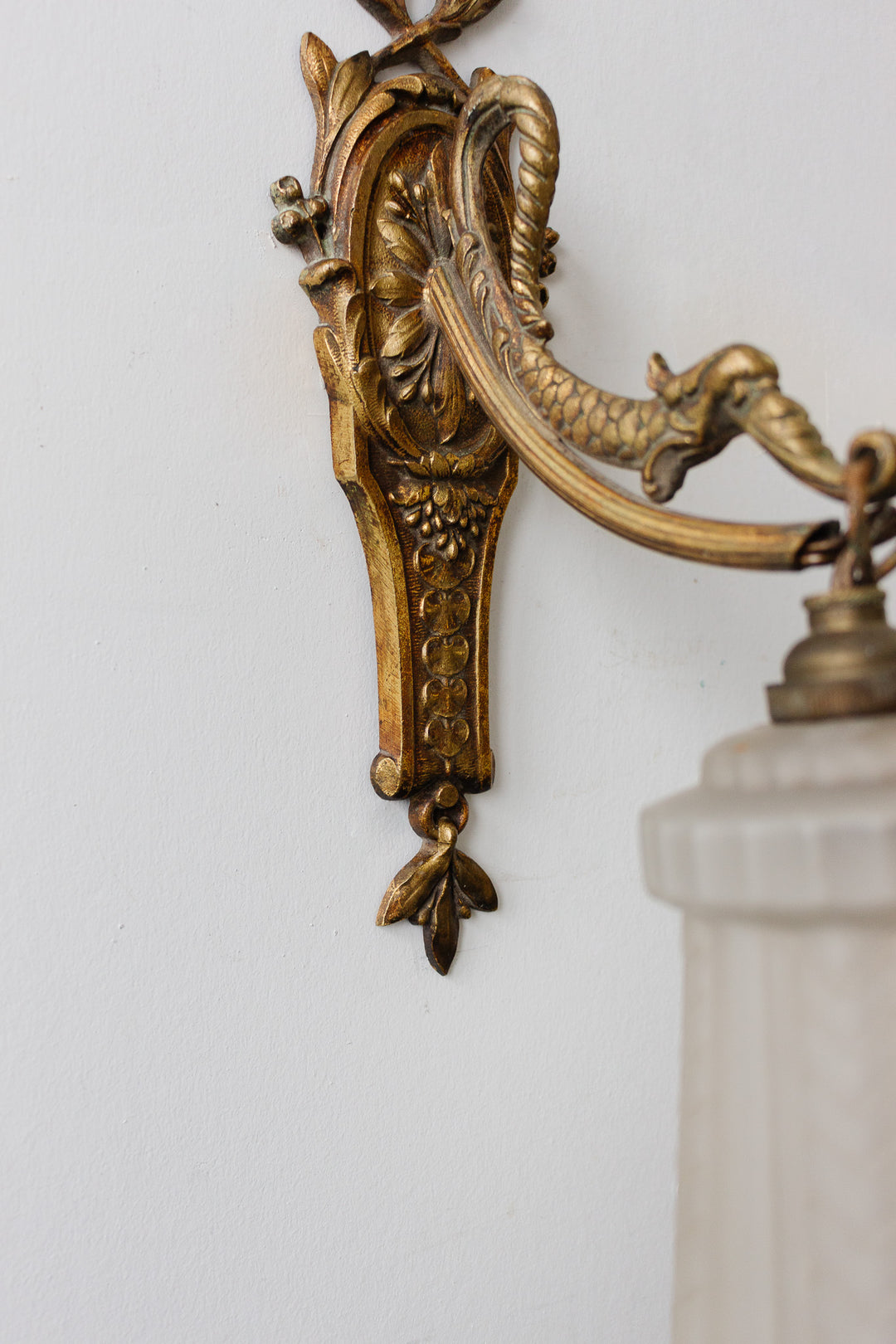 pair of art deco french brass wall sconces with glass shades