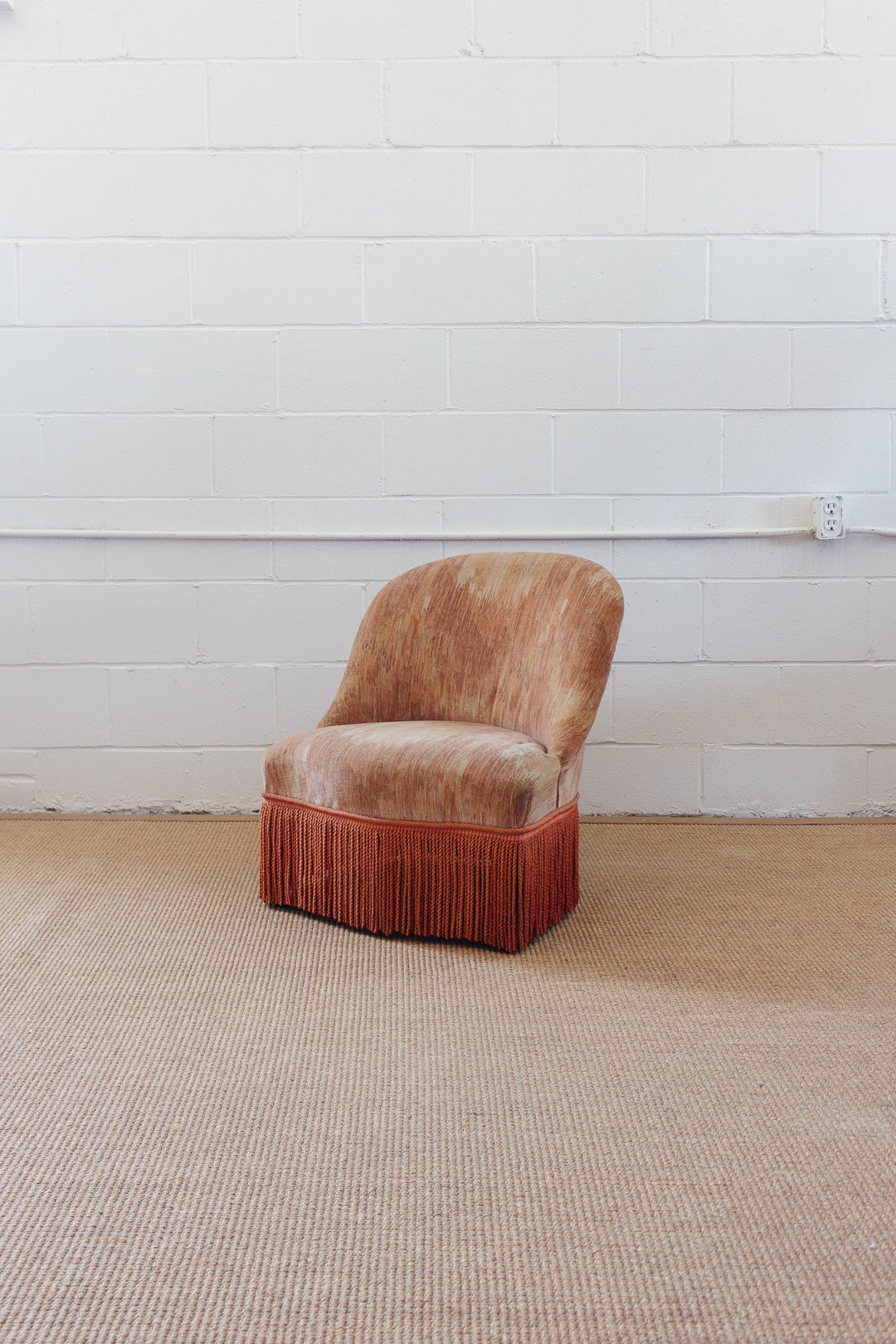 antique French velvet blush crapaud chair with fringe