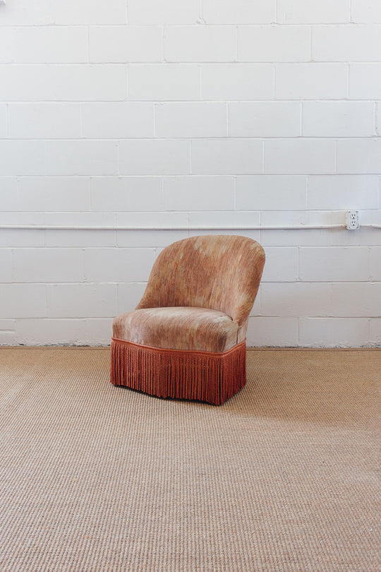 antique French velvet blush crapaud chair with fringe