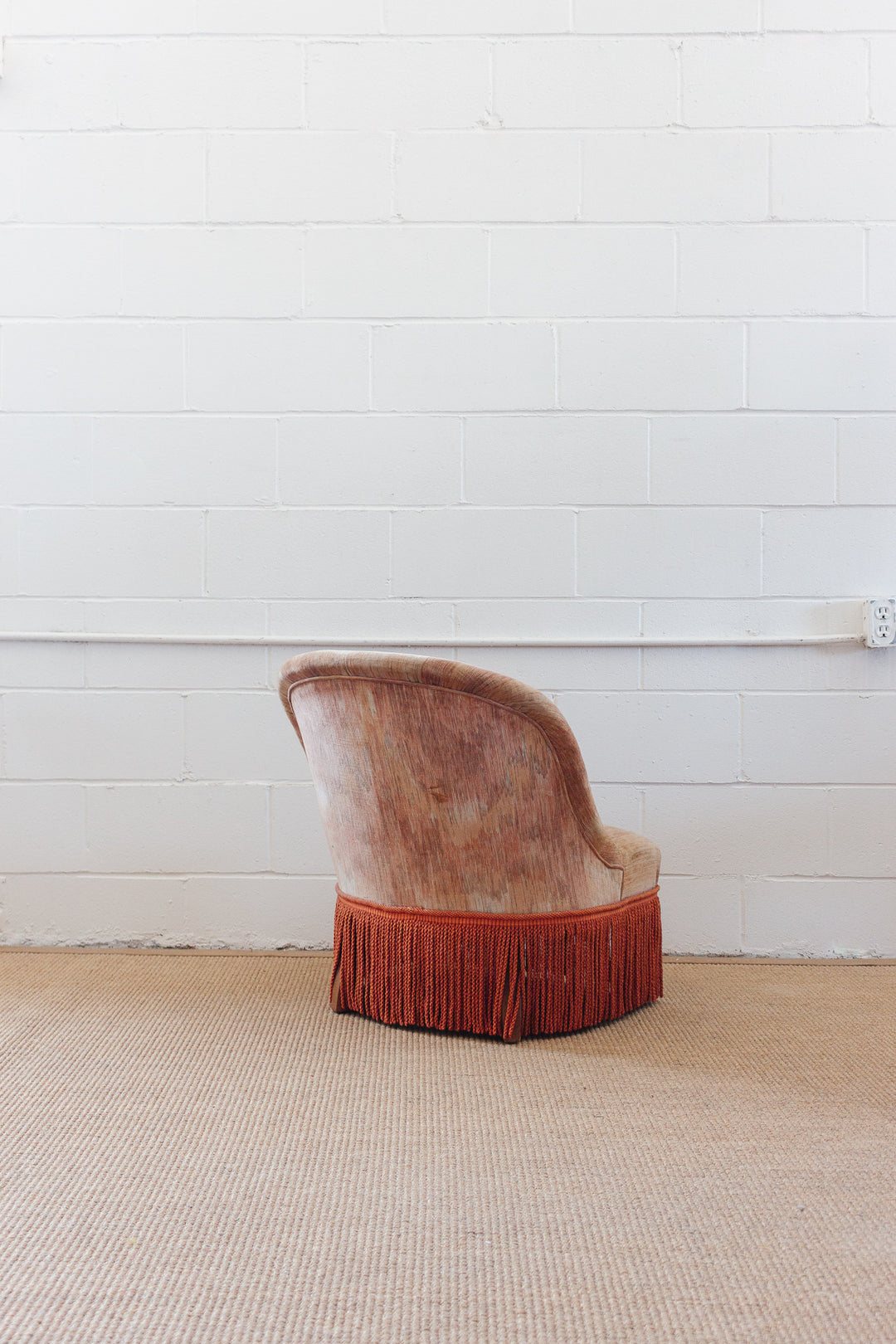 antique French velvet blush crapaud chair with fringe