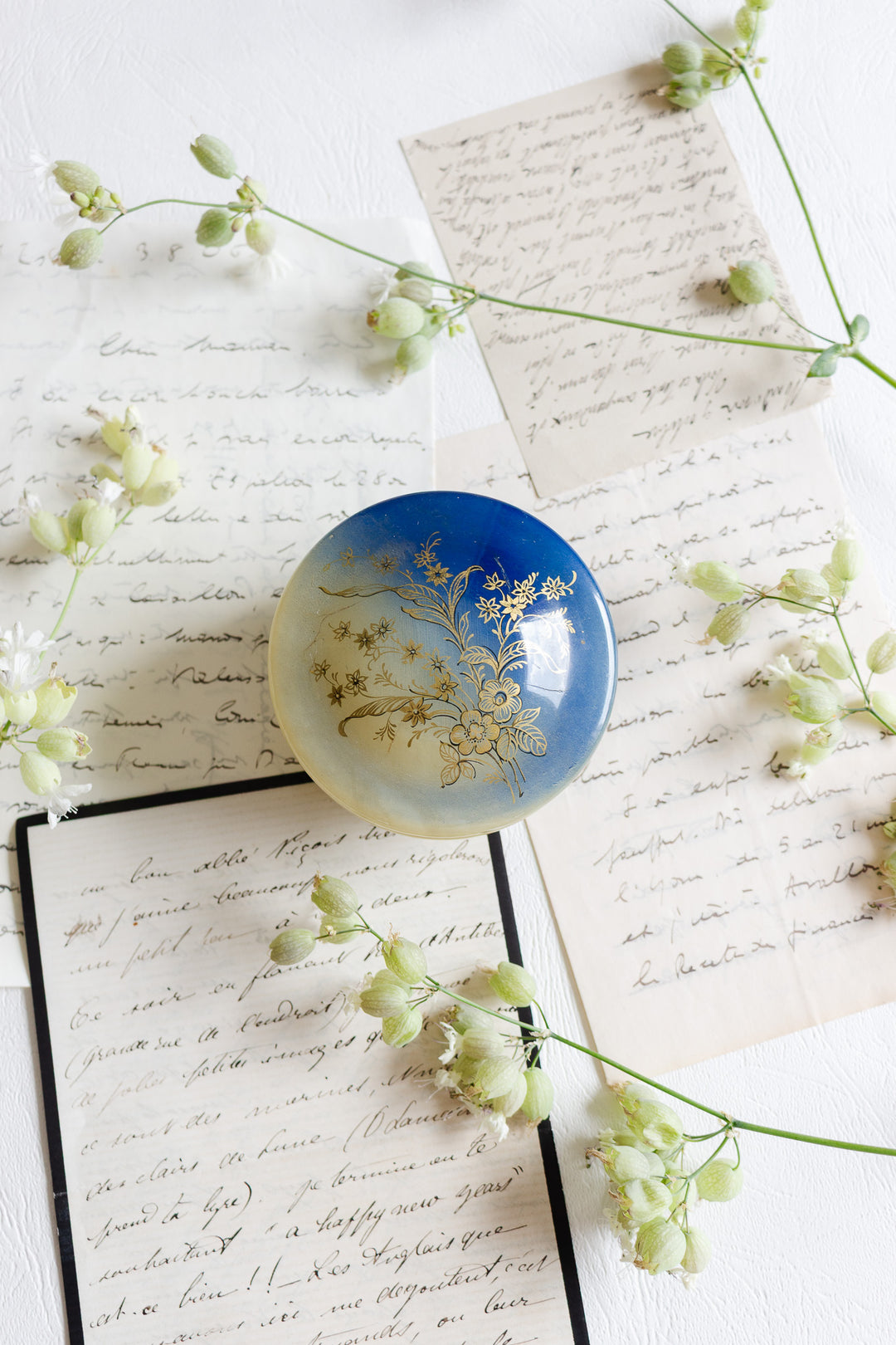vintage french onyx trinket box with silkscreen florals
