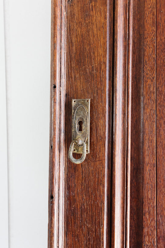 antique french gilt metal keyhole escutcheon with drop pull