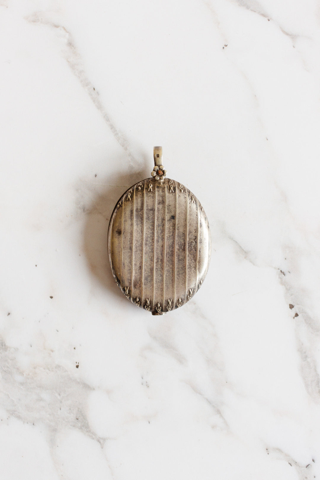 turn of the century French silver repousse art nouveau mirrored slide locket