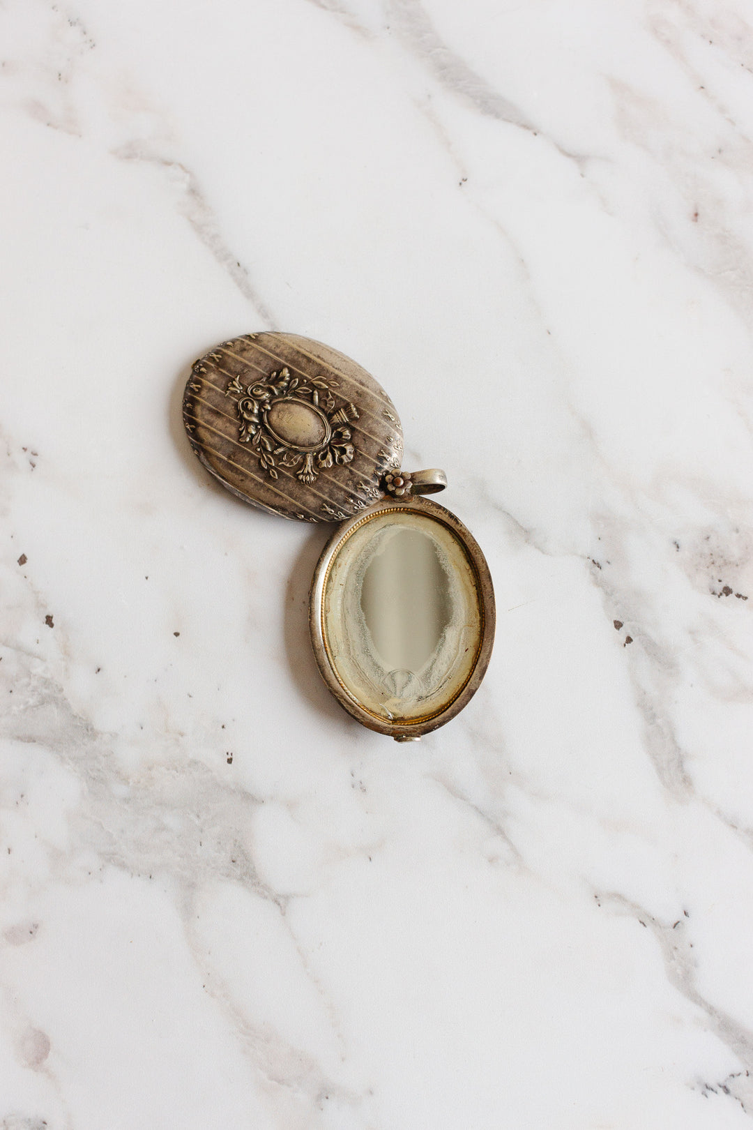 turn of the century French silver repousse art nouveau mirrored slide locket
