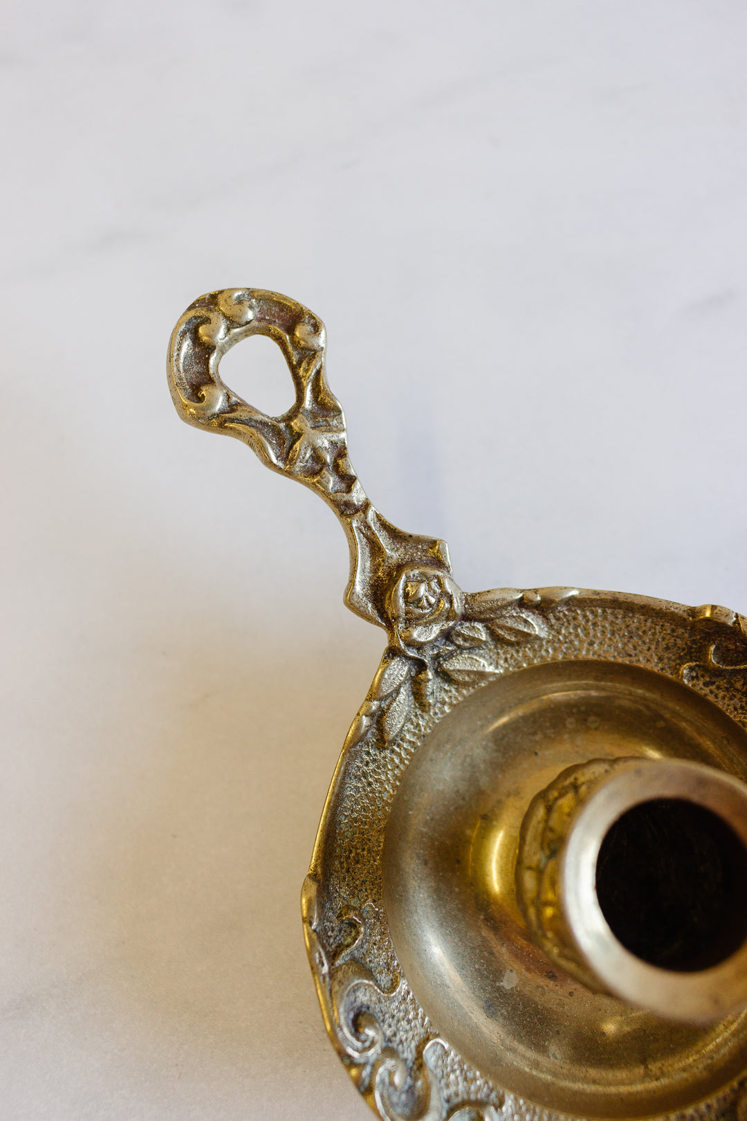 vintage French cast brass “rosette” chamberstick