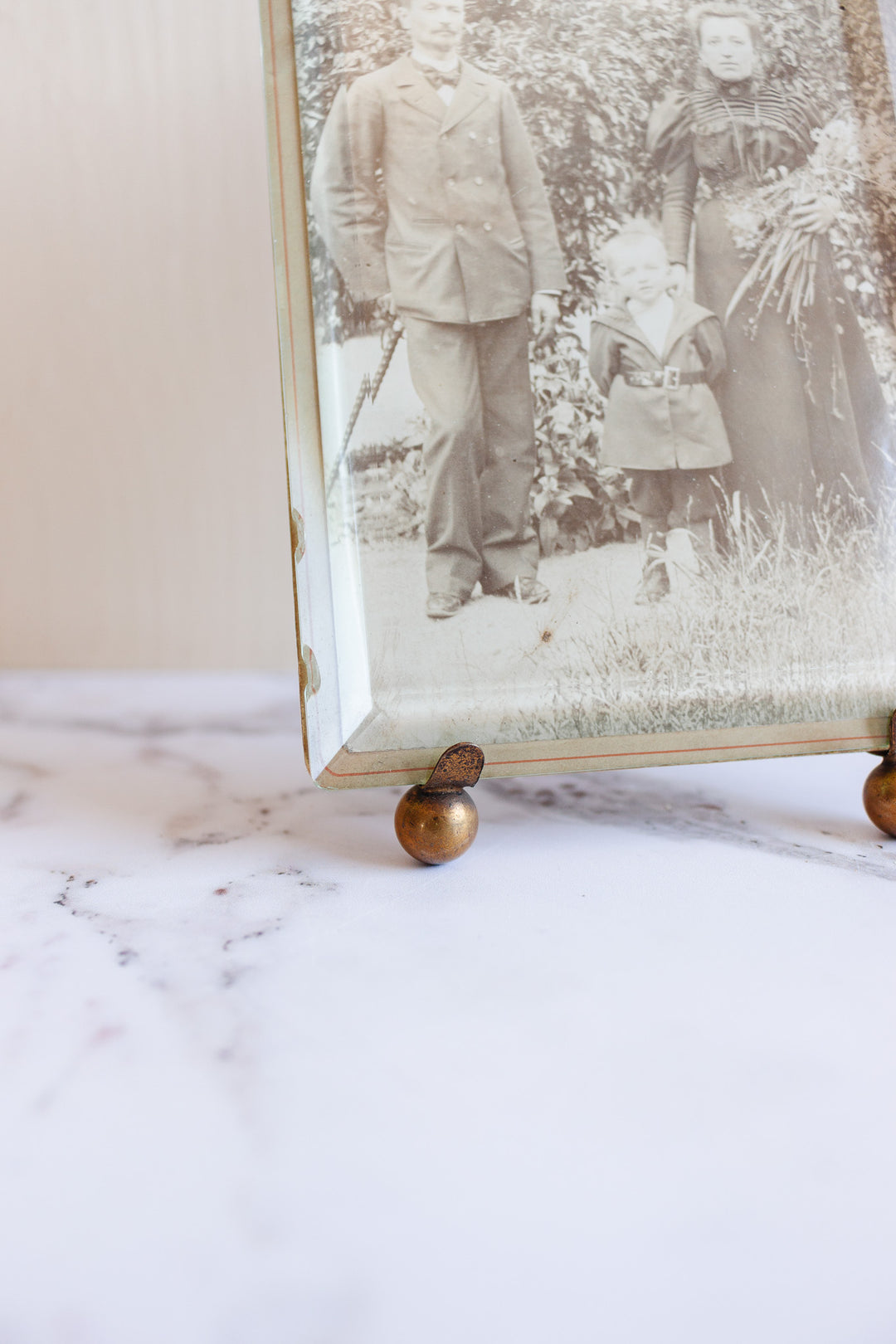 turn of the century French Napoleon III beveled glass & brass frame