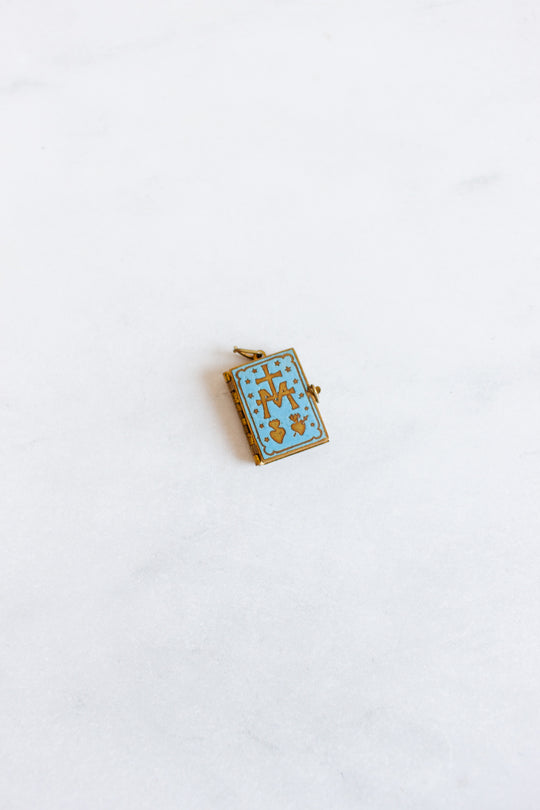 turn of the century French repousse and enamel sacred heart “ex voto” book pendant