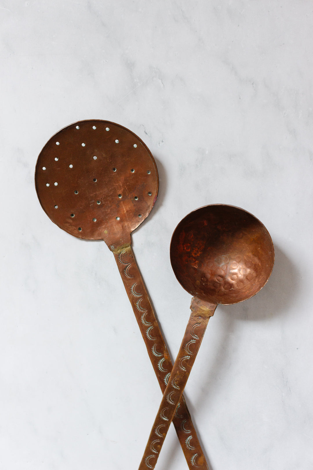 pair of antique French extra large hand forged copper utensils