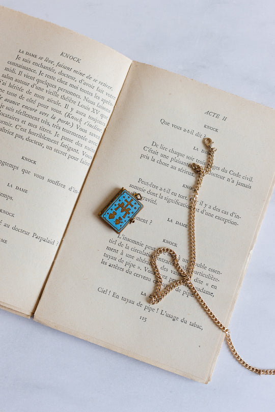 turn of the century French repousse and enamel sacred heart “ex voto” book pendant