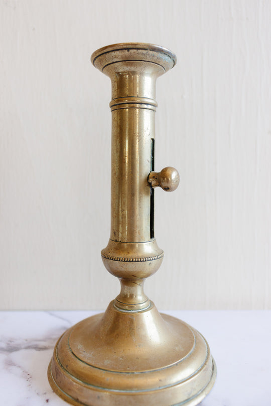 antique french brass push up candlestick