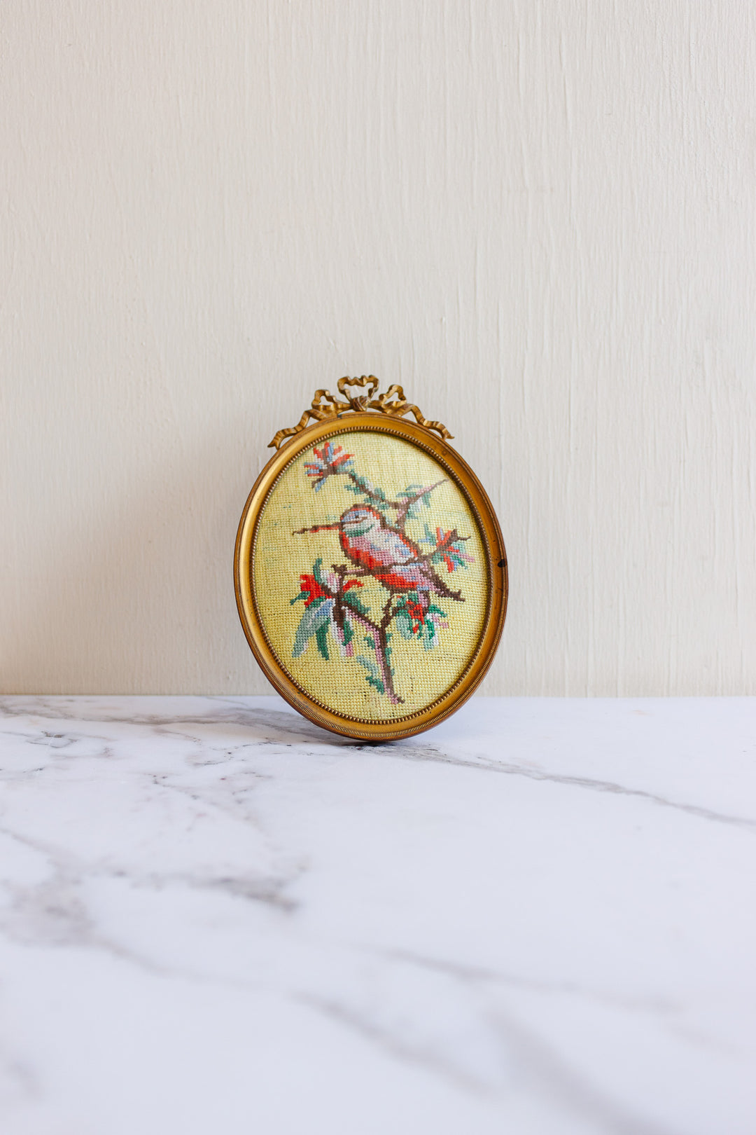 rare pair of turn of the century French Louis XVI brass frames with 1920s petit point "oiseaux chinoiserie"