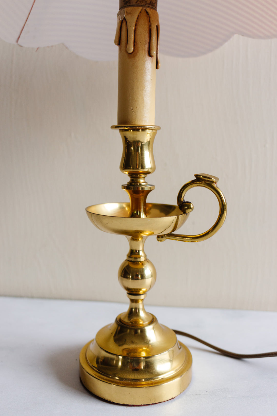 vintage French brass chamberstick lamp with scalloped ticking fabric shade