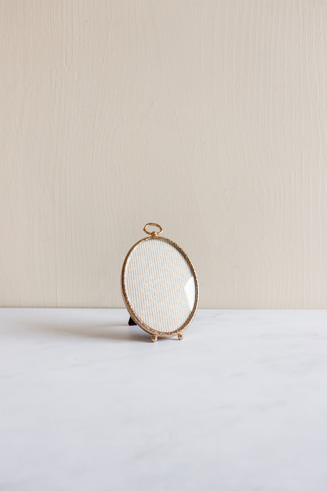 antique 24k gold plated frame with convex glass