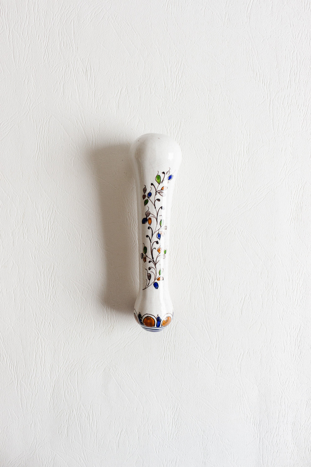 vintage ceramic pestle in the style of moustiers