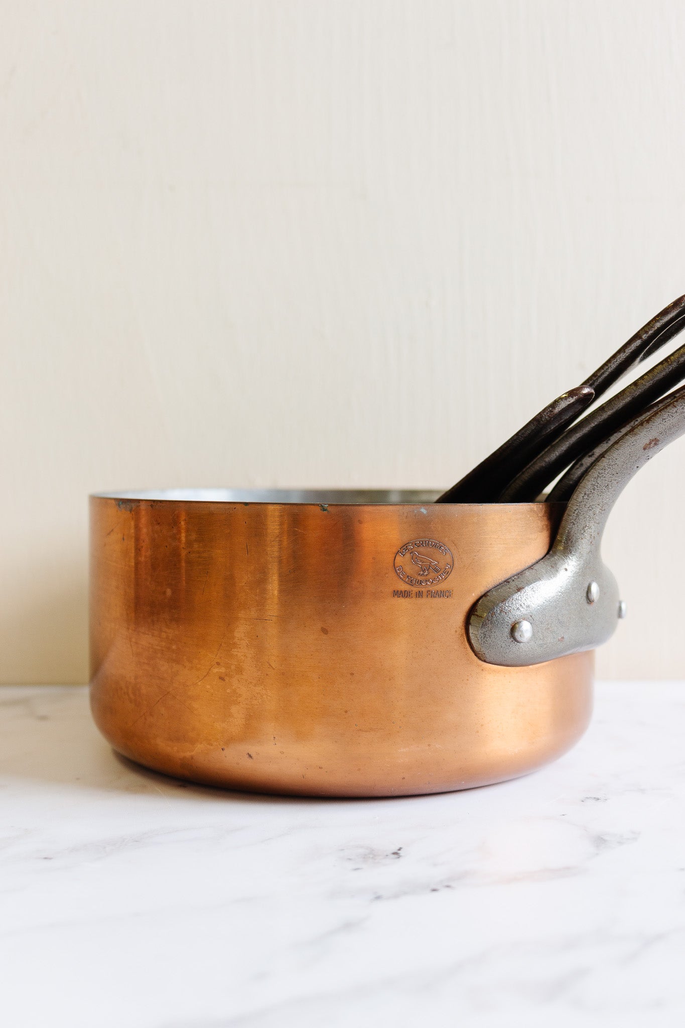 set of five vintage French graduated copper saucepans, stamped