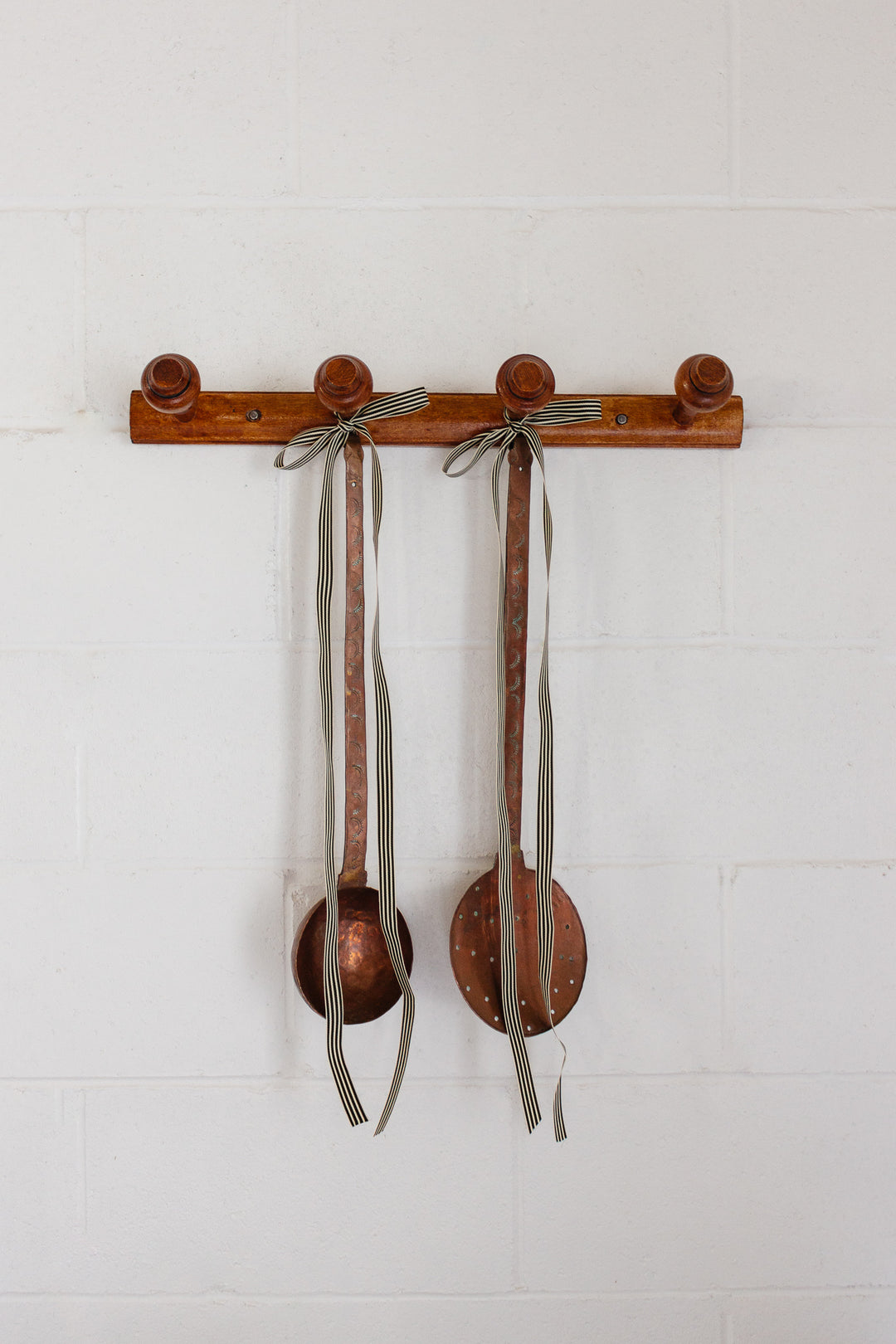 pair of antique French extra large hand forged copper utensils