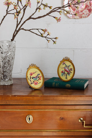 rare pair of turn of the century French Louis XVI brass frames with 1920s petit point "oiseaux chinoiserie"