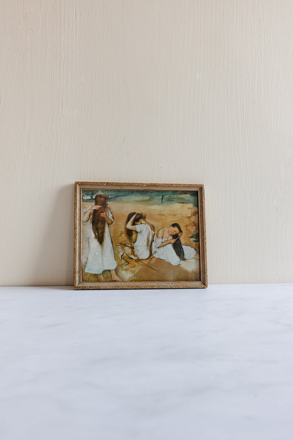 vintage framed print “women combing their hair” by Degas