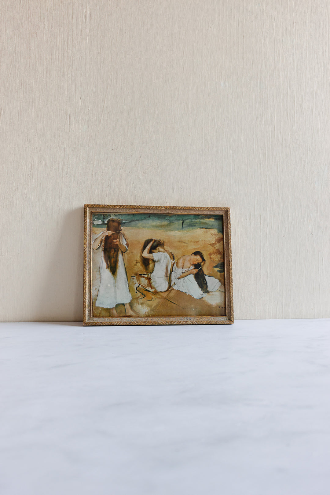 vintage framed print “women combing their hair” by Degas