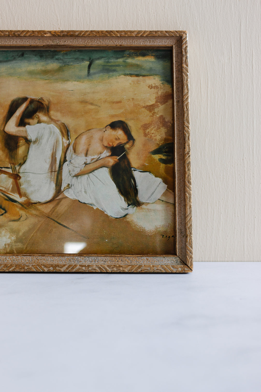 vintage framed print “women combing their hair” by Degas