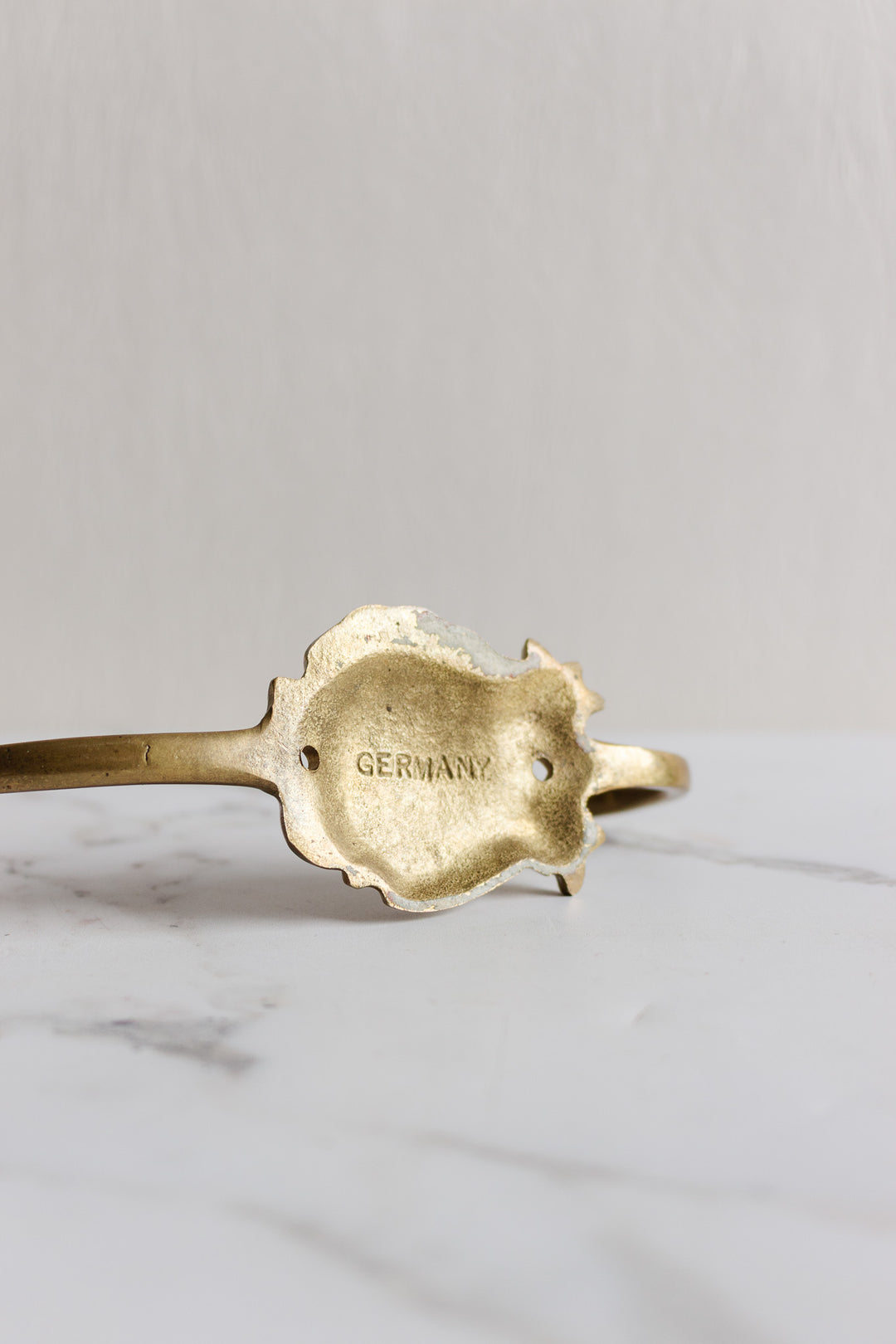 vintage german cast brass hat hook