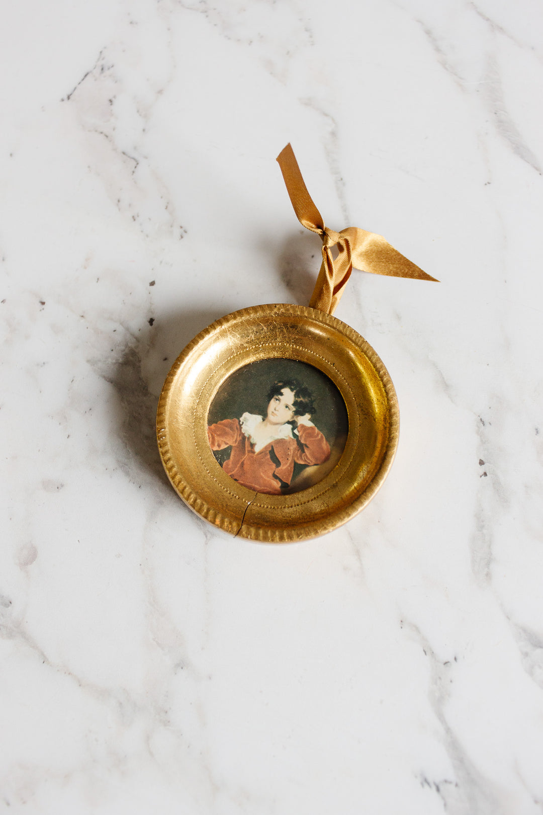 pair of vintage round florentine frames