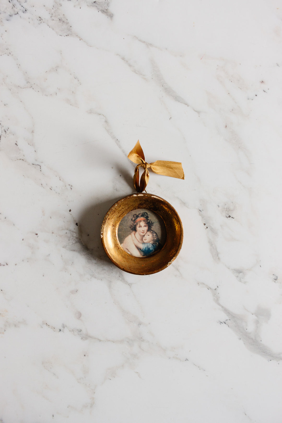 pair of vintage round florentine frames