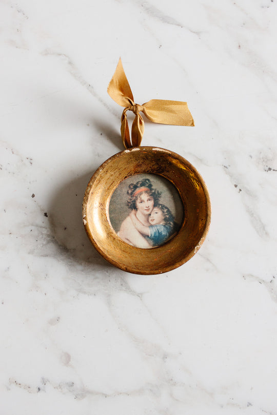 pair of vintage round florentine frames