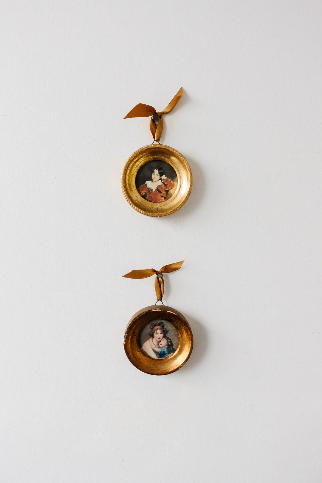 pair of vintage round florentine frames