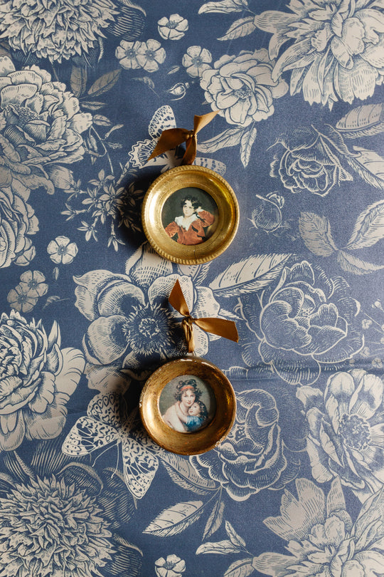pair of vintage round florentine frames
