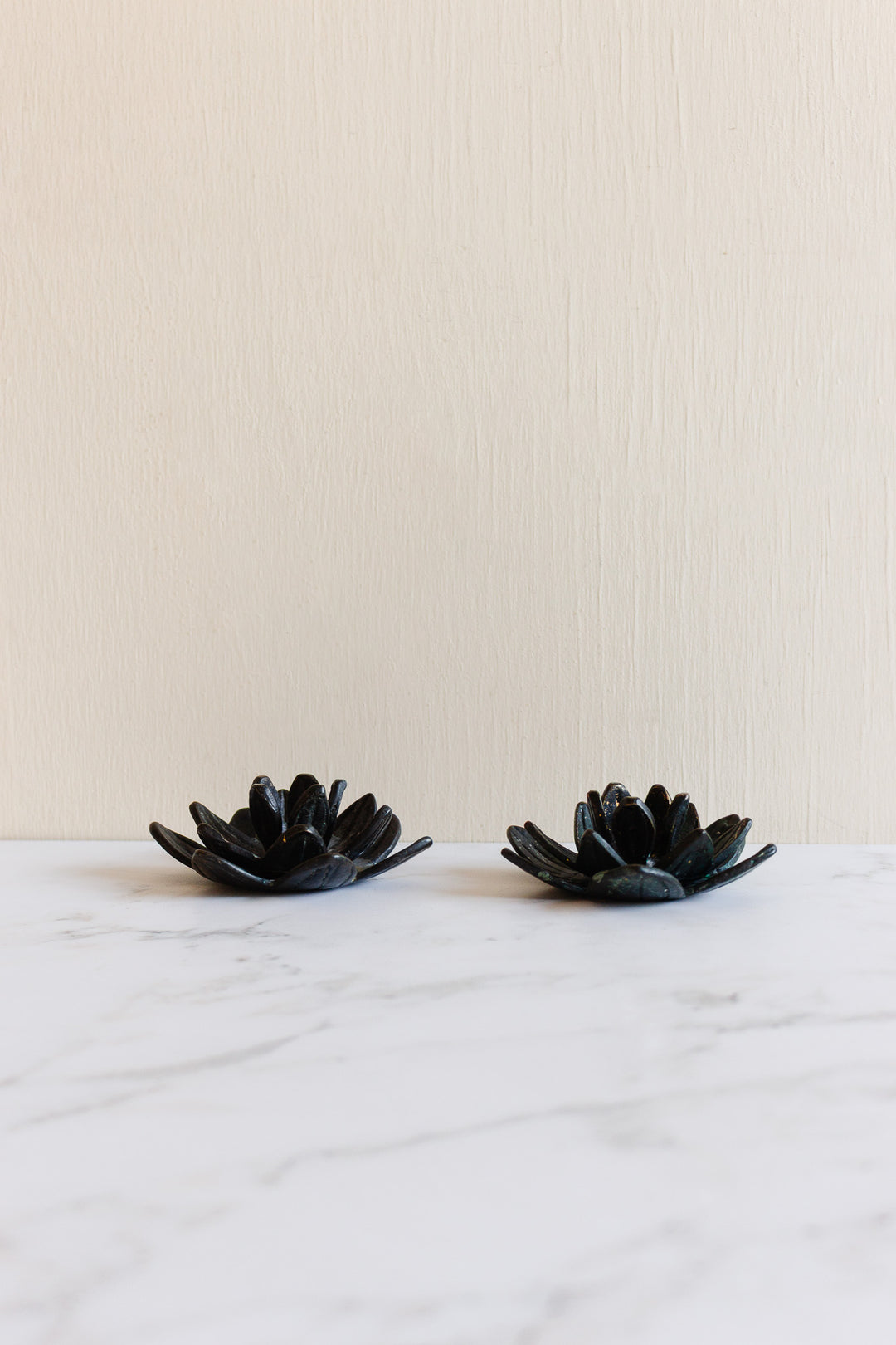 pair of vintage french sculptural lotus candlesticks