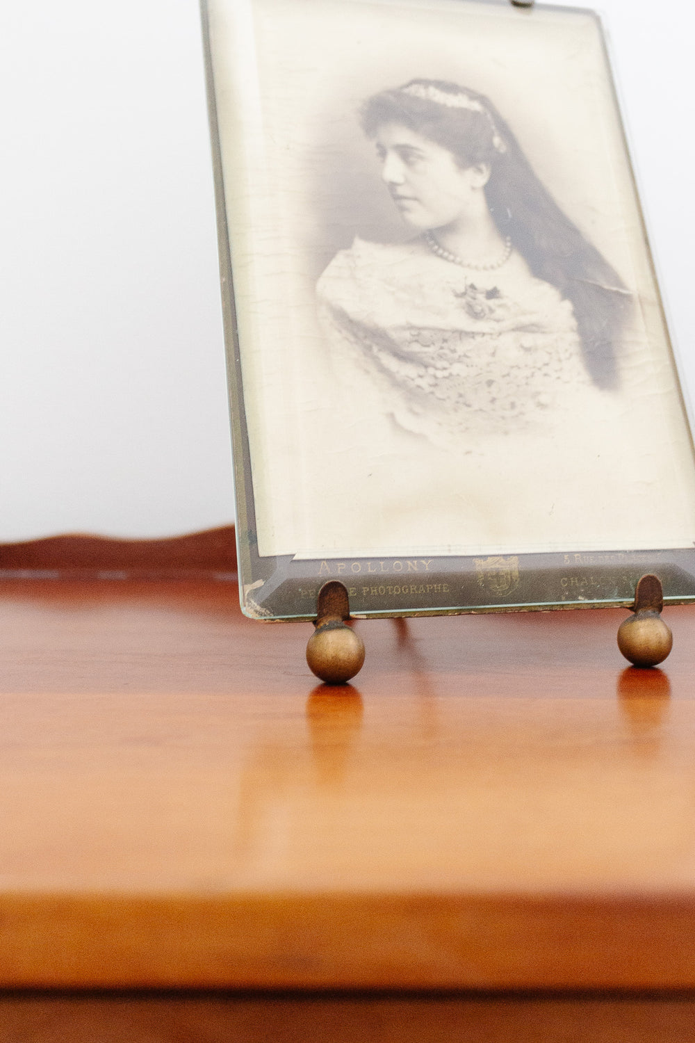 turn of the century French Napoleon III beveled glass & brass frame