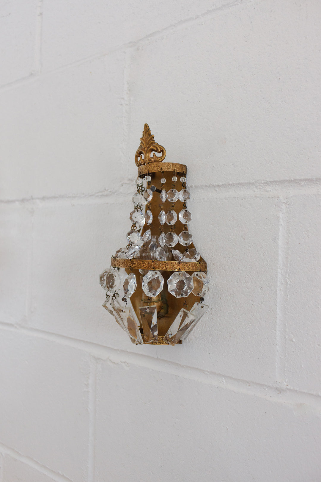 pair of midcentury French empire brass & crystal wall sconces