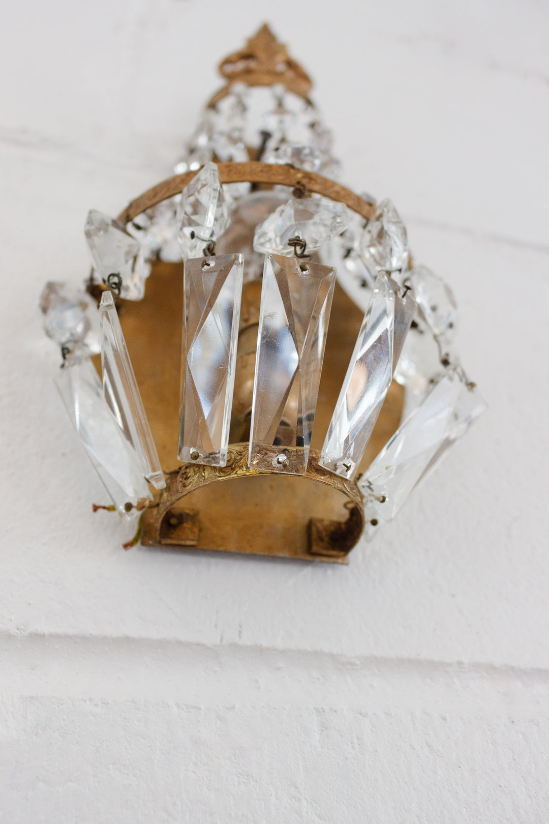 pair of midcentury French empire brass & crystal wall sconces