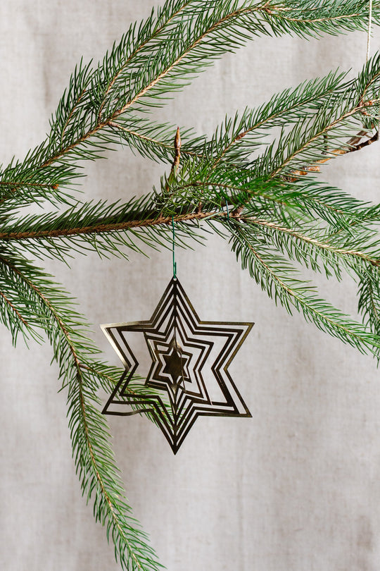 vintage german hand pressed accordion metal six point star ornament