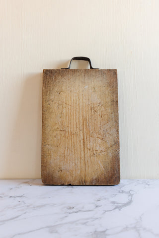 1920s French rustic breadboard with iron handle