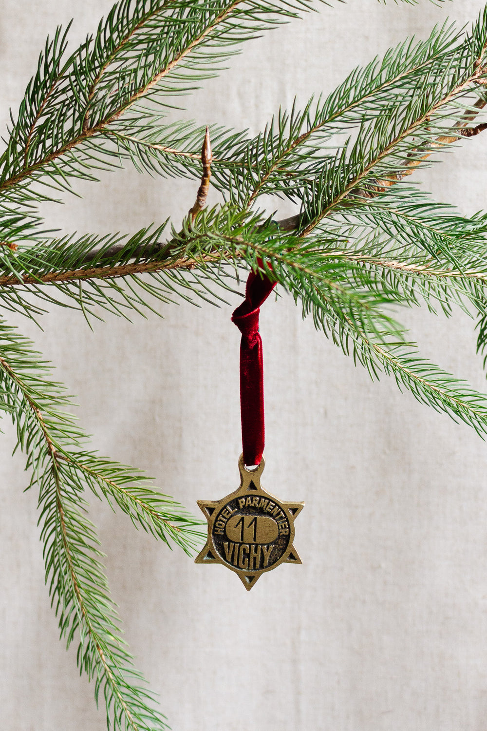 rare 1920s french étoile "hotel parmentier" brass key fob