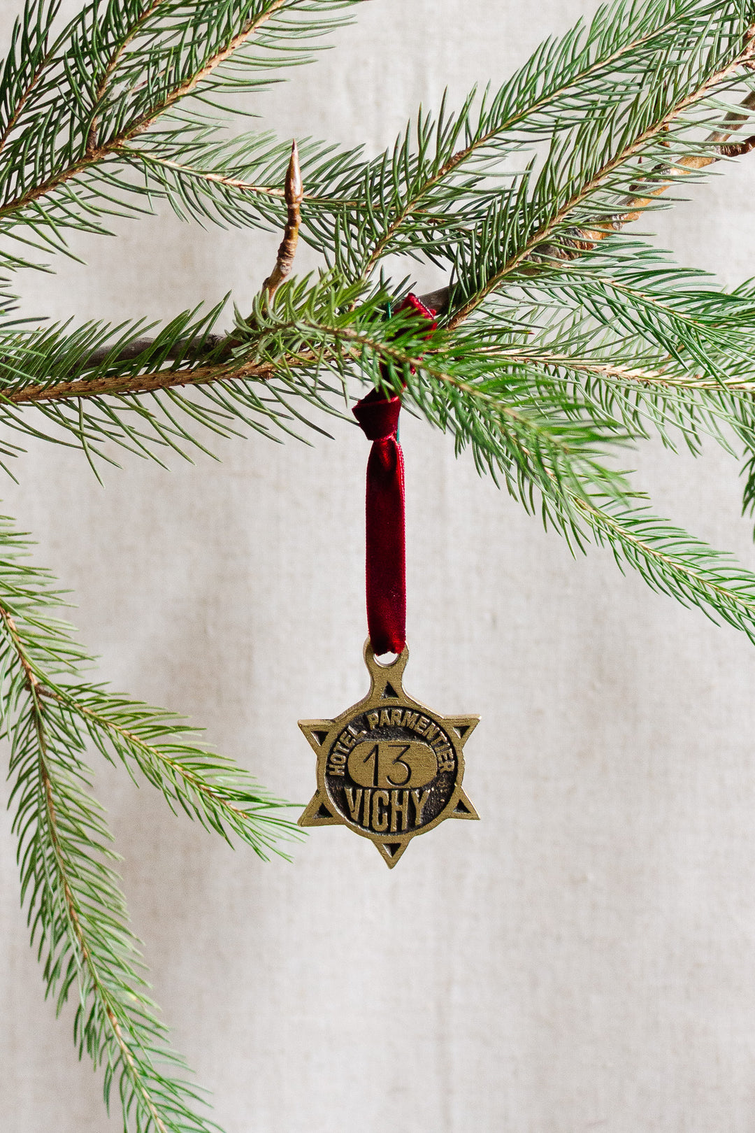 rare 1920s french étoile "hotel parmentier" brass key fob