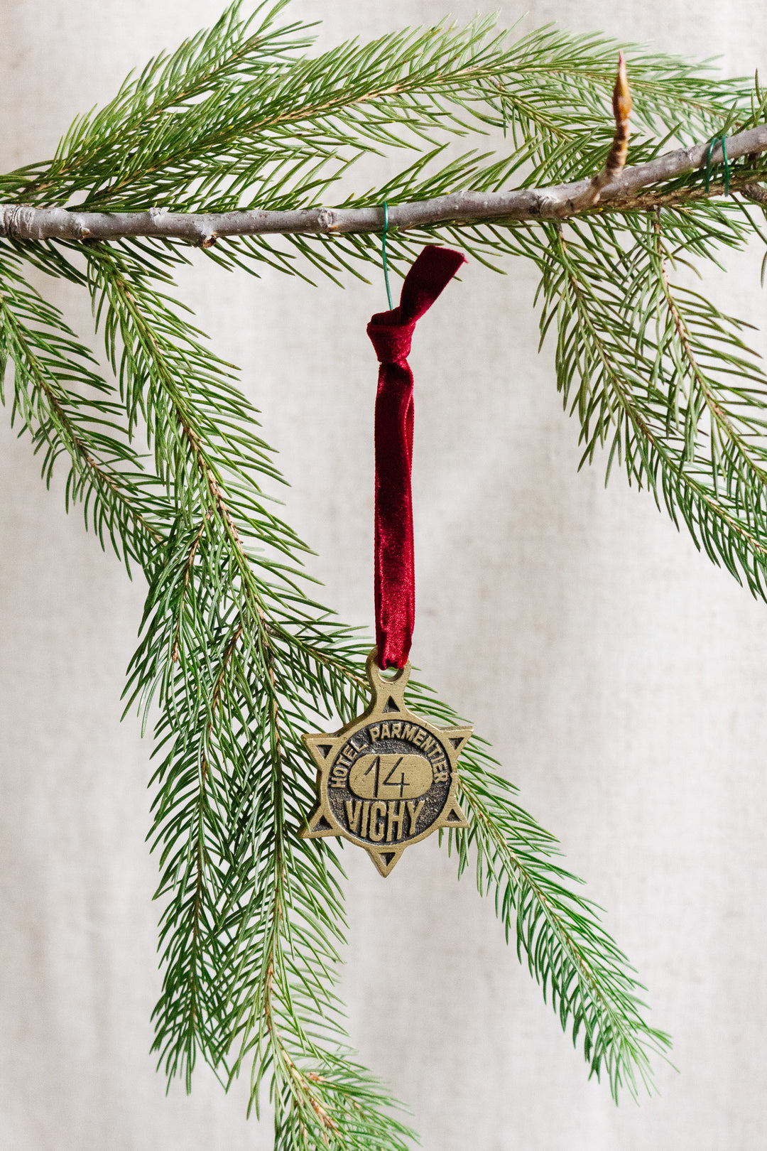 rare 1920s french étoile "hotel parmentier" brass key fob