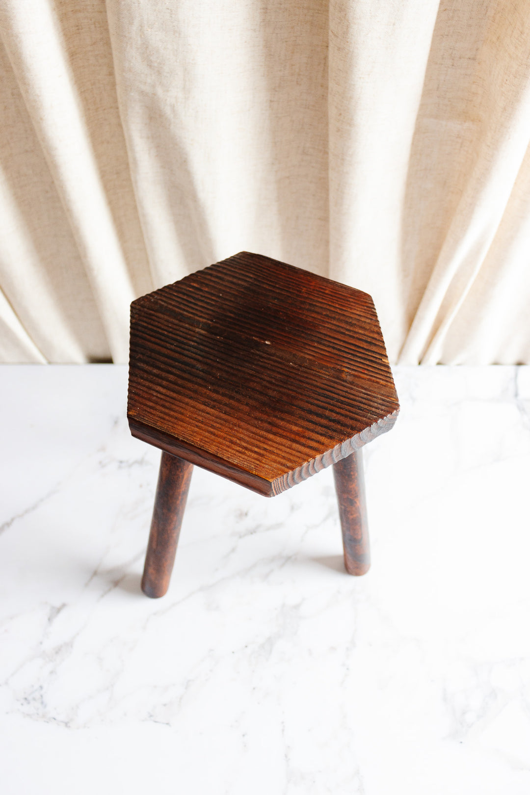 midcentury french brutalist stool with hexagonal top