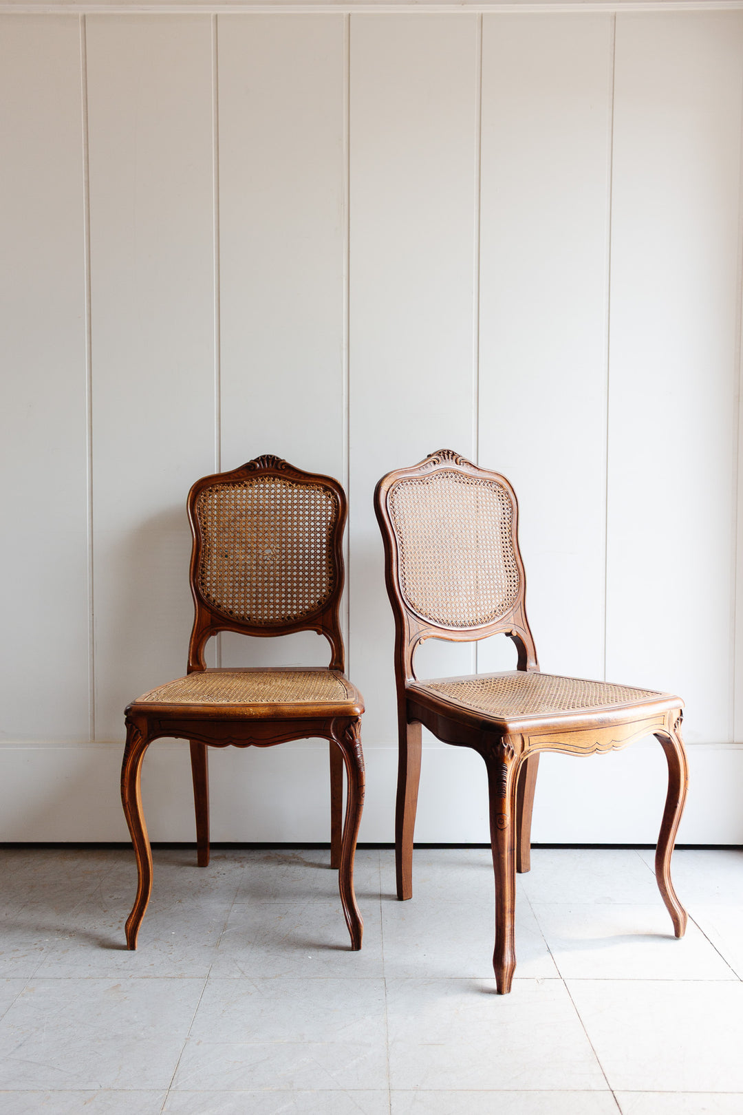vintage French Louis XV walnut and cane dining chairs, set of 2